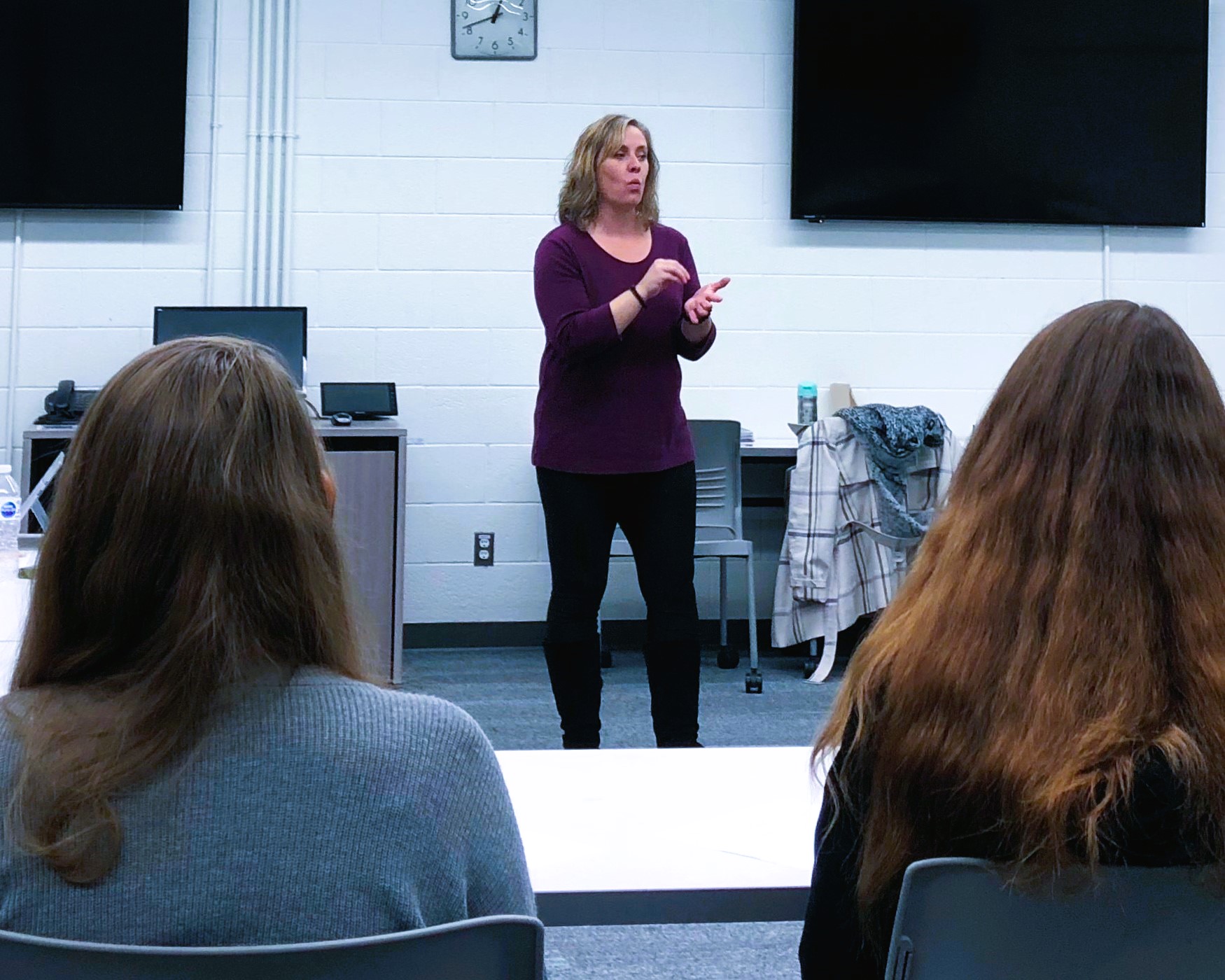 Embrace Network Guelph group sitting around a boardroom table
